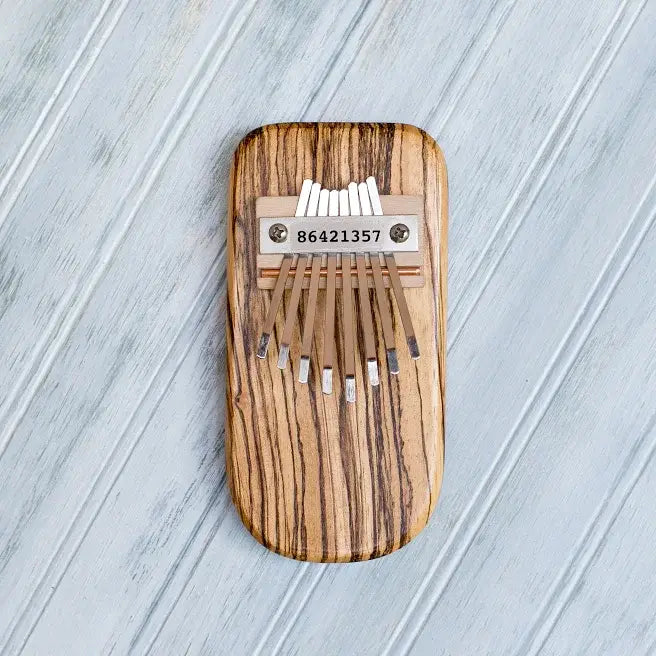 Thumb Pianos by Mountain Melodies